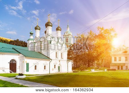 The Chernigov Martyrs church in Moscow Russia with sun rays