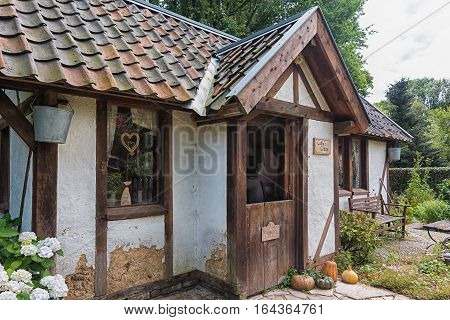 Landgraaf, Netherlands - July 12, 2016: Image of a cottage in the English garden of Park Mondo Verde.