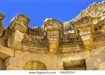 Decorations Nymphaeum Public Fountain Ancient Roman City Jerash Jordan. Jerash came to power 300 BC to 100 AD and was a city through 600 AD. Not conquered until 1112 AD by Crusaders. Famous Trading Center. Most original Roman City in the Middle East.