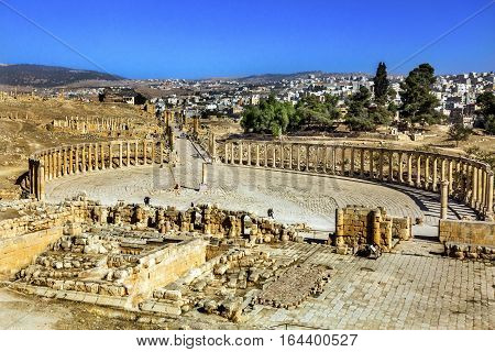 Oval Plaza 160 Ionic Columns Ancient Roman City Jerash Jordan. Jerash came to power 300 BC to 100 AD and was a city through 600 AD. Not conquered until 1112 AD by Crusaders. Famous Trading Center. Most original Roman City in the Middle East.