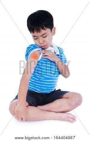 Full Body Of Asian Child Injured At Shoulder. Isolated On White Background.