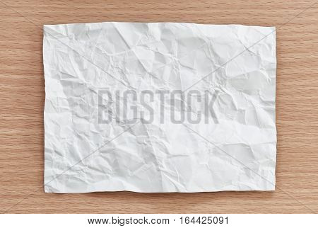 notepad paper crumpled of empty and copy space on wooden backgroundYou can input the message text in picture.