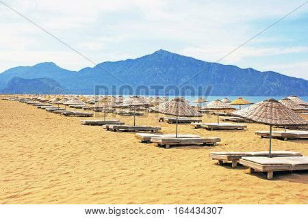 Sun loungers on a famous Iztuzu beach in Turkey