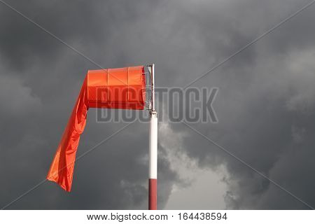 Wind sock of equipment check the wind blow direction in day time and no wind blow on overcast sky cloudy.