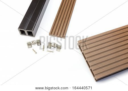 Brown composite decking plank with fastening material