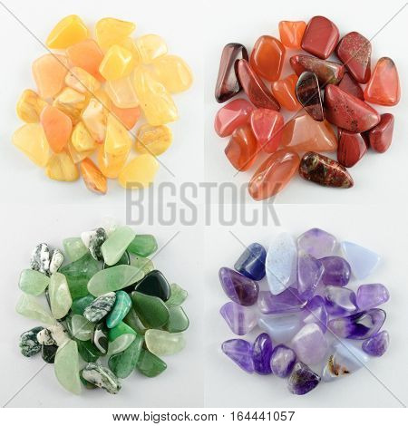 Mixed colorful stones isolated on white background