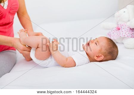 Putting Clotes On Baby
