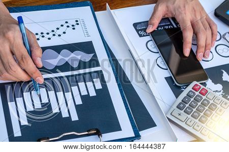Business Workers Discussing Digital Graphs And Diagrams Indicating Progres.