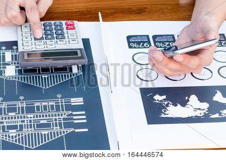 Business Workers Discussing Digital Graphs And Diagrams Indicating Progres.