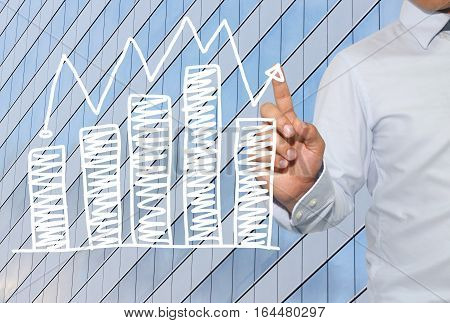 Finger Of Businessman Touch To Bar Graph Businessconcept Of Business Investment And Profits And Asse