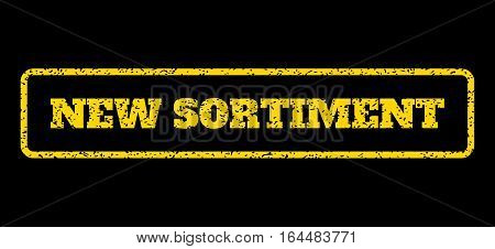 Yellow rubber seal stamp with New Sortiment text. Vector message inside rounded rectangular frame. Grunge design and unclean texture for watermark labels. Horisontal sign on a blue background.