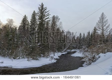 Winter river in Siberia. Winter landscape in Khakasia.