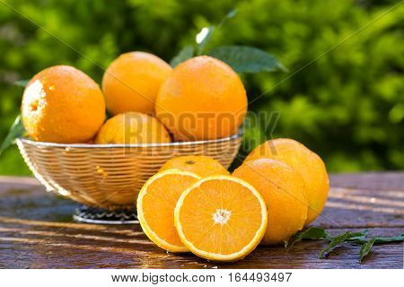 Sweet Fresh Oranges In Natural Light On Old Wood