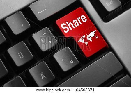 grey keyboard with red enter key share internet