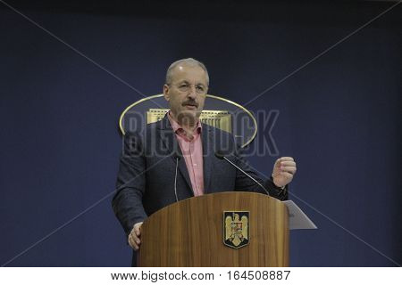 Bucharest Romania 5 December 2015: Romanian Vice Prime Minister and Minister of Regional Development and Public Administration Vasile Dincu speaks during a press conference at Bucharest Headquarters.