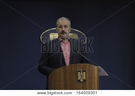 Bucharest Romania 5 December 2015: Romanian Vice Prime Minister and Minister of Regional Development and Public Administration Vasile Dincu speaks during a press conference at Bucharest Headquarters.