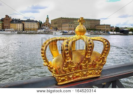 Skeppsholmsbron (Skeppsholm Bridge) with Golden Crown on a bridge in Stockholm Sweden