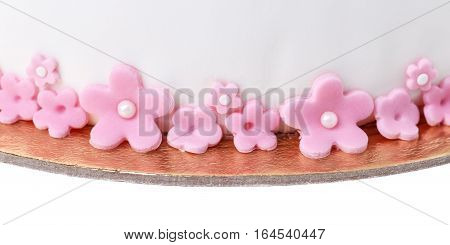 sugar flowers, marzipan flowers and mastic, beautiful decor for decorating cakes on a white background