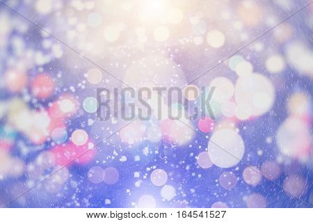 Abstract Festive background. Glitter vintage lights background with lights defocused. Christmas and New Year feast bokeh background with copyspace.