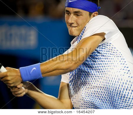MELBOURNE - 22 gennaio: Bernard Tomic dell'Australia nel suo terzo turno perdita di Rafael Nadal di Spagna 