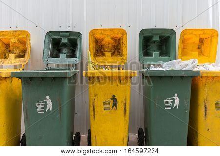 Yellow and green Recycle Bins in Thailand