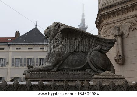 Lion with wings symbol of the French city of Lyon. Detail architecture Basilica of Notre-Dame de Fourviere is located on the hill of Fourviere. Lyon. France.