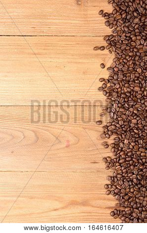 Coffee Background. Heap Roasted Coffee Beans Spread Over On Table