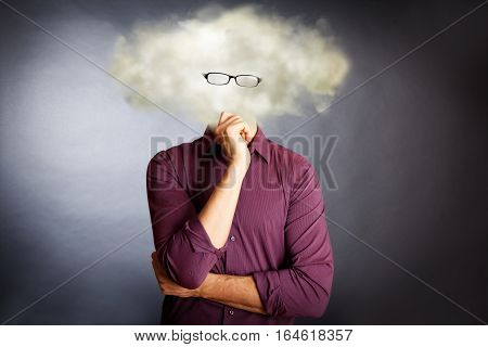 an IT guy with a cloud for a head and flying digital numbers, illustrating 'cloud computing'