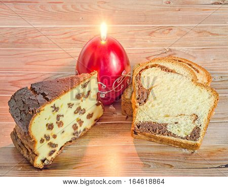 Cakes Called Pasca Made With Cheese And Raisins, Cozonac With Smashed Nuts, Egg Shape Candle, Wood B