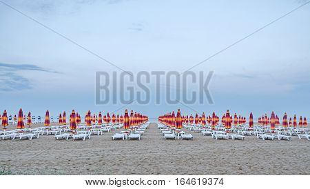 Albena, Bulgaria - June 13, 2016. The Black Sea Shore. Blue Sea Water, Clouds Sunset Sky, Beach Sand
