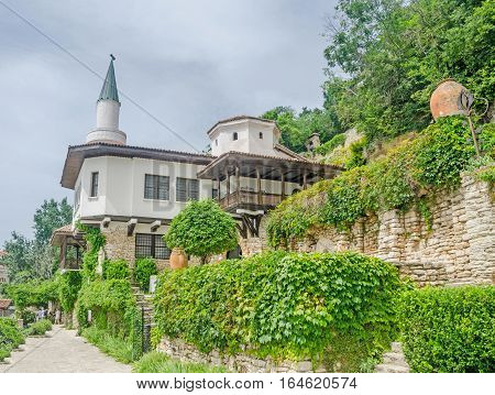 BALCHIK BULGARIA - JUNE 19 2016. The Balchik Palace (Castle) of romanian queen Marie botanic garden green vegetation