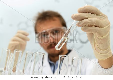 Chemist scientist conducts research of medical product in the laboratory