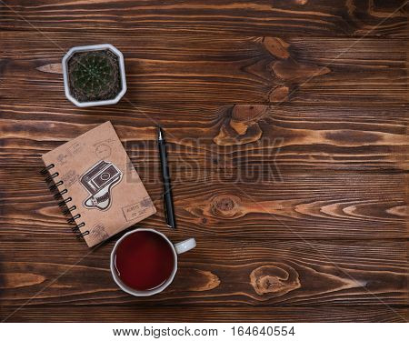 notebook with a pen on the table