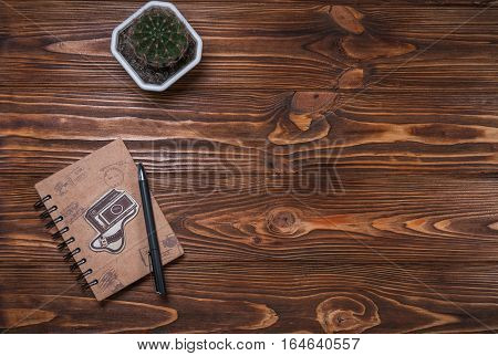 notebook with a pen on the table