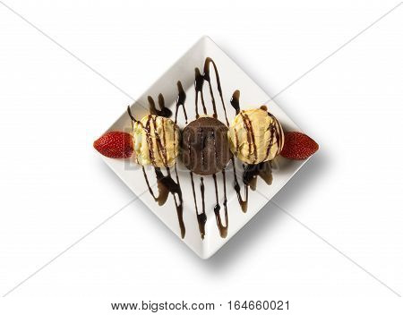 Petit Gateau Dessert With Ice Cream And Strawberry In White Background