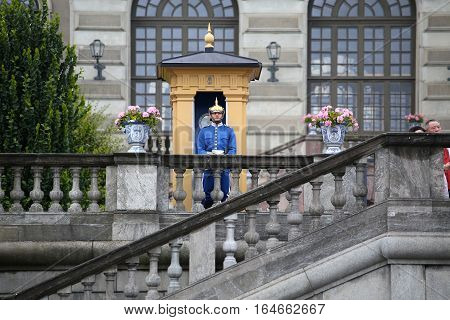 STOCKHOLM SWEDEN - AUGUST 20 2016: Swedish Royal Guards of honor in blue uniforms near the Royal Palace in Stockholm Sweden on August 20 2016.