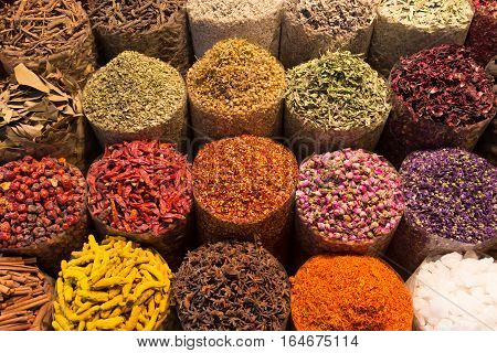 Spices and herbs being sold on street stal at Morocco traditional market.