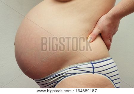 Very beautiful belly of a pregnant woman