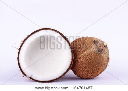 fresh coconut half clipping path for coconut milk and coconut shell  on white background fruit food isolated