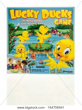 Winneconne WI - 8 January 2017: Box of Lucky Ducks color matching game on an isolated background.