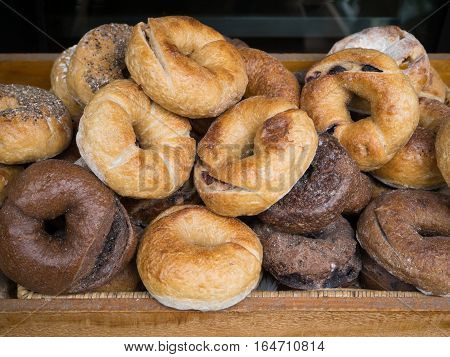 2 kinds of bagels on basket. bread