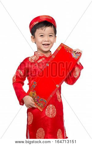 Vietnamese Boy Kid congratulating with his New Year. Happy Lunar New Year.