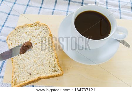 black coffee with whole wheat bread for breakfast