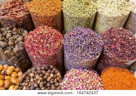 Spices and herbs being sold on street stal at Morocco traditional market.
