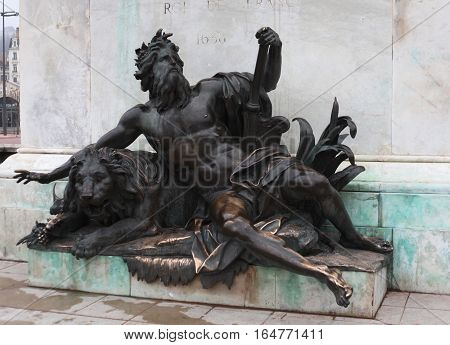 Lyon, France - December 20, 2016: allegorical figure representing the Rhone river. Detail of the monument to King Louis XIV  in December 20 in Lyon