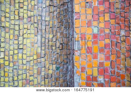 Mosaic tile background. Mosaic decoration in different colors. Abstract texture of byzantine smalt in old tradition.