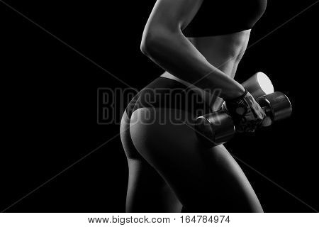 No stepping back. Horizontal monochrome closeup of sexy toned buttocks of a female fitness model copyspace