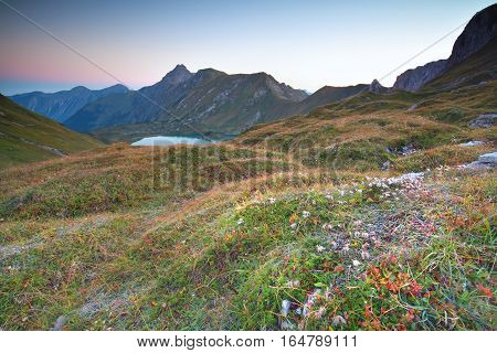 morning over alpine lake Allgauer Alps Germany