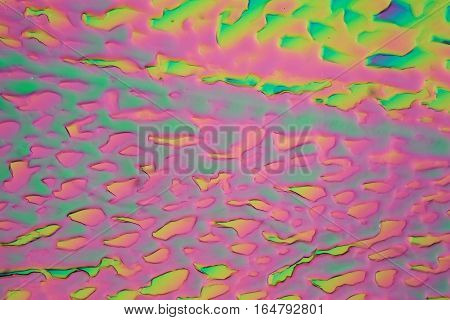 Xylitol crystals under the microscope and in polarized light. Xylitol is a sugar alcohol and used as sweetener.
