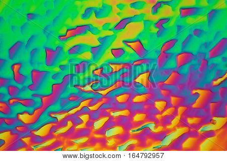 Xylitol crystals under the microscope and in polarized light. Xylitol is a sugar alcohol and used as sweetener.